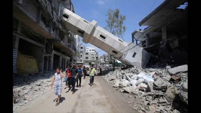 Una organización internacional que evalúa la situación posterior a conflictos bélicos dice que la reconstrucción de viviendas en Gaza después de la guerra con Israel tomará 20 años. (AP)