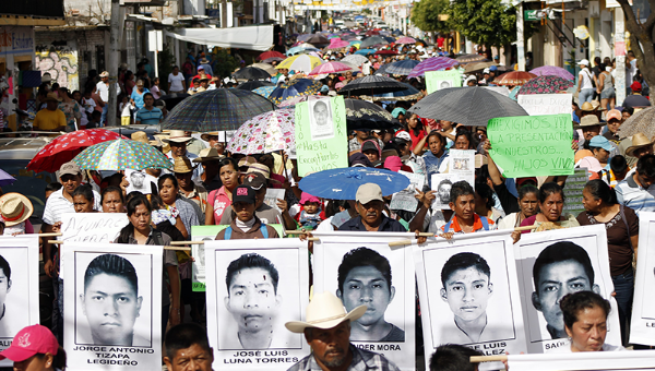 Protesters demand justice for the 43 disappeared Ayotzinapa students.