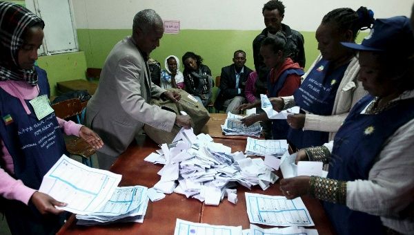 Election officials count votes at the end of the voting exercise in Ethiopia