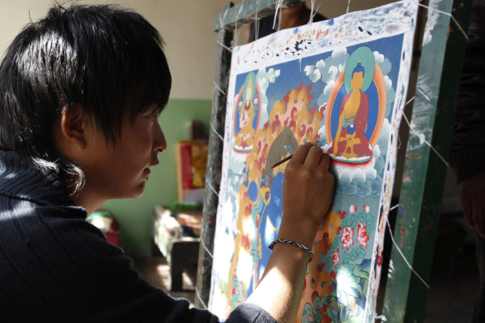 El thangka es una pintura realizada sobre una superficie plana, que puede ser enrollada