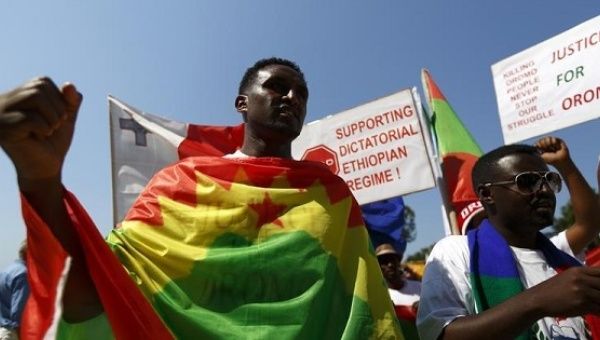 Ethiopian migrants of the Oromo community living in Malta protest against the Ethiopian regime, Valletta June 16, 2014.