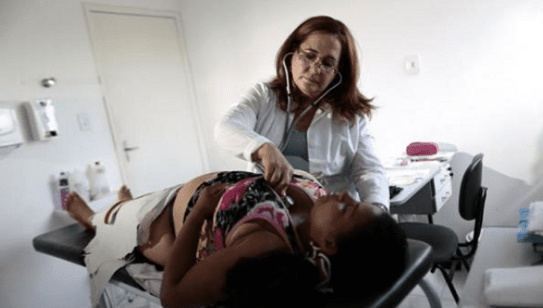 Cuban doctor Elza Vega Rodriguez inspects a pregnant patient at the Health Center in the city of Piaus in the state of Bahia, north-eastern Brazil Nov. 20, 2013.