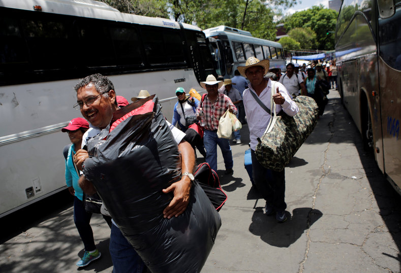 Protesters from the National Coordinator of Education Workers (CNTE) teachers' union arrive in Mexico City to attend a march against President Enrique Peña Nieto