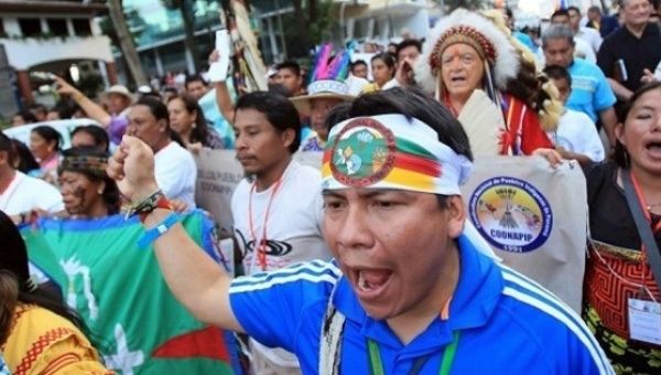 Ngabe Bugle people of Panama, fighting the Barro Blanco dam, march alongside Indigenous representatives of other nations.