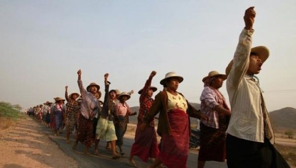 Villagers protest after their land was seized to allow for the expansion of a copper mine in Sagaing Division, March 13, 2013. 