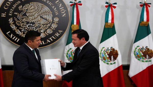 Miguel Angel Osorio Chong, secretario de Gobernación, fue el encargado de entregar el informe de Peña Nieto y llamó a la "unión" en México