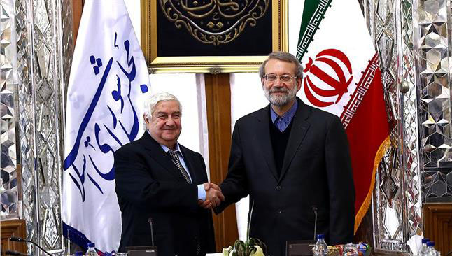 El canciller Walid al-Mualem (i) se reunió en Teherán con Ali Lariyaní.