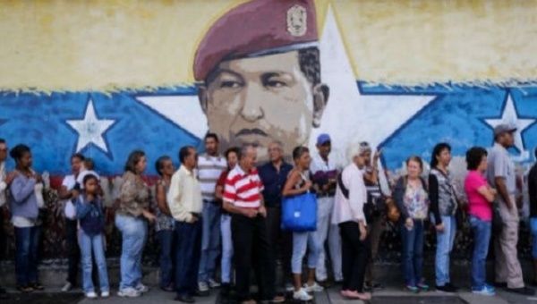 Voters line up to cast their ballot in Venezuela