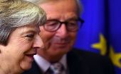 Tanto Jean-Claude Juncker como Theresa May esperan que el Parlamento británico apruebe el acuerdo del brexit firmado el domingo en Bruselas.