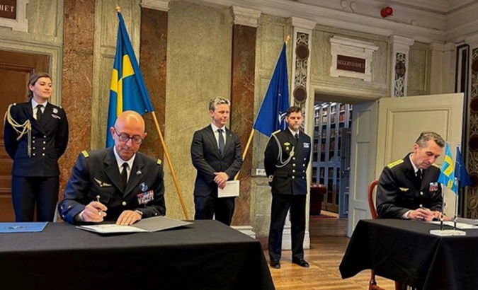 Signing of declaration completing Swedish military integration phase to NATO.