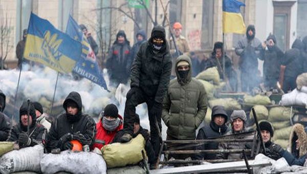 Los líderes opositores esperan que se levanten los cargos contra los manifestantes para poder evacuar los edificios de Kiev. (Foto: Archivo)