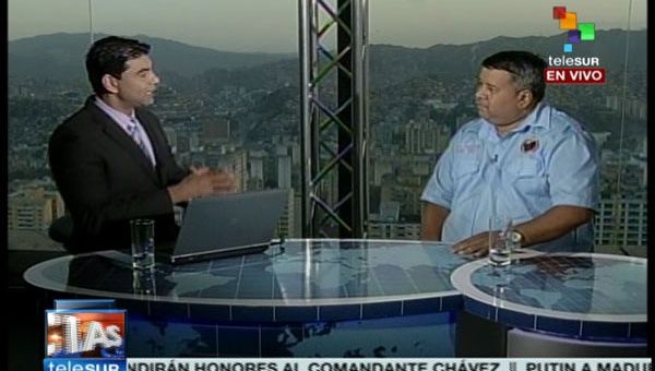 En una entrevista exclusiva para teleSUR, el periodista Abraham Istillarte conversó con el portavoz de la comuna “Alexis vive”, Robert Longa sobre el  legado del presidente Chávez. (Foto: teleSUR).