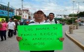 Padres, maestros y estudiantes de nueve escuelas normales marchan exigiendo la liberación de los 57 jóvenes desaparecidos (Foto: EFE)
