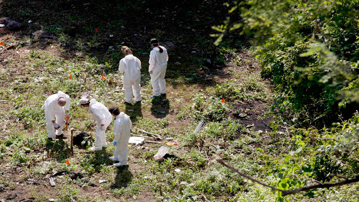 Los expertos forenses aseguran que los cadáveres de Cerro Viejo no son de los normalistas (Foto:Reuters)
