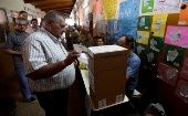 Electores argentinos votan para elegir presidente del país en el balotage entre Daniel Scioli y Mauricio Macri.