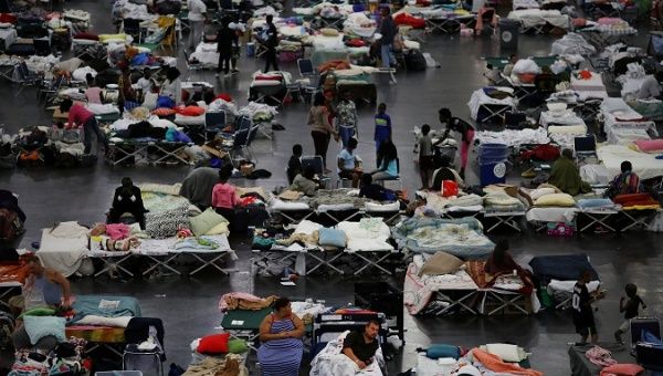 Evacuees affected by Tropical Storm Harvey take shelter at the George R. Brown Convention Center in downtown Houston, Texas, U.S., August 31, 2017