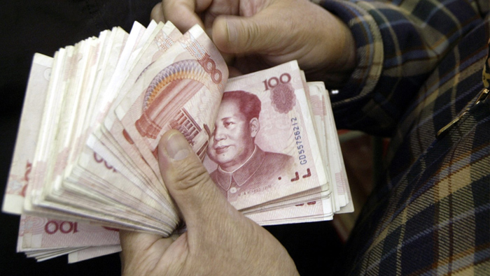 Según los economistas, el yuan chino representa una amenaza a la hegemonía del dólar estadounidense.