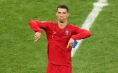 Cristiano Ronaldo escaped a red card after appearing to strike Iran’s Morteza Pouraliganji.