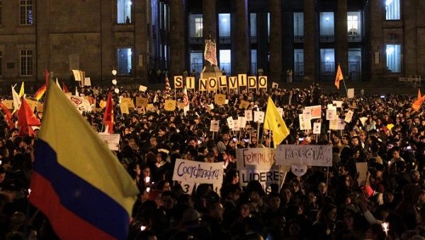 Colombians protest against the killing of social activists, in Bogota.