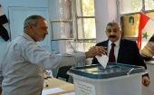 Ciudadanos sirios acuden a los centros de votación para ejercer su derecho al voto