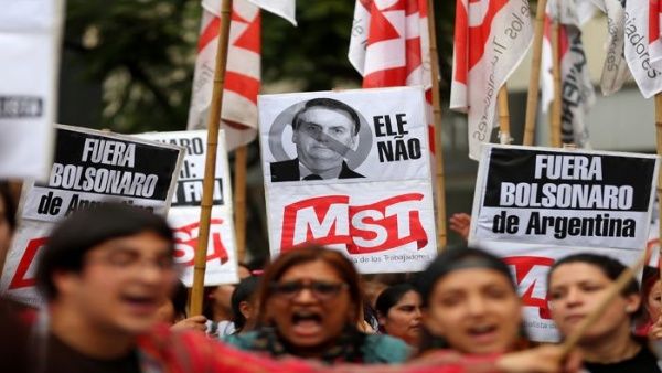 Resultado de imagen para protesta visita bolsonaro macri