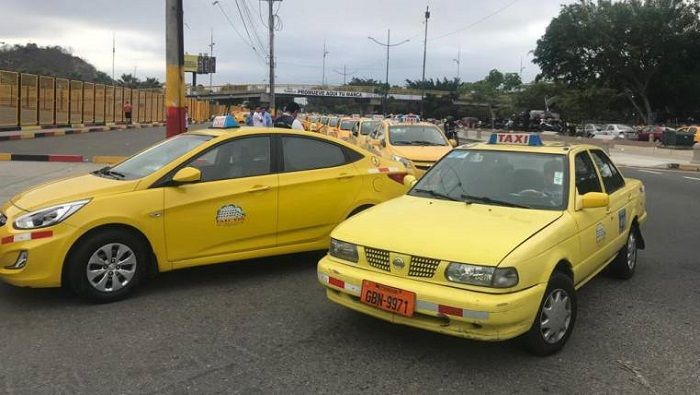 La protesta de este miércoles logró reunir a unos 15.000 taxistas agremiados en la ciudad capital ecuatoriana.