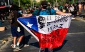 Chilenos exigen la renuncia de Piñera y la liberación de los presos políticos que han sido acusados de desorden público.