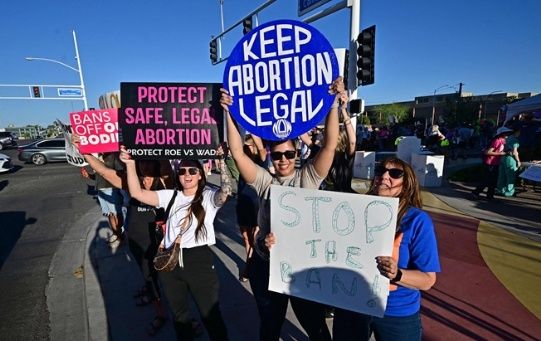 Pro-abortion rights demonstrators rally in Scottsdale, Arizona, April 15, 2024.